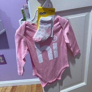 6 month M and M onesie and sock pair unopened